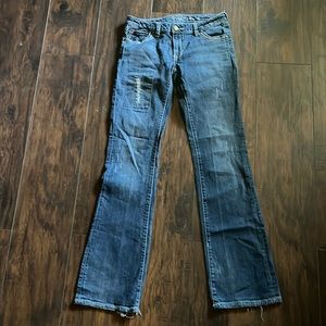 Dark wash wrangler rock 47s